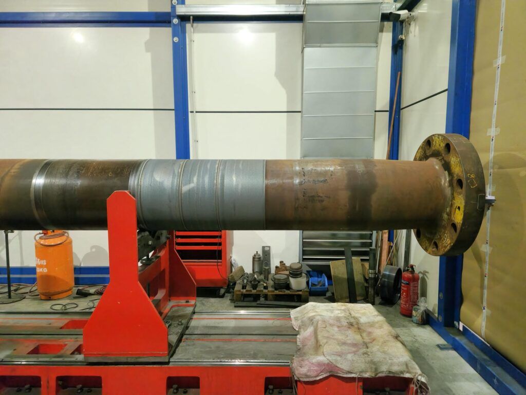 Propeller shaft during laser cladding buildup